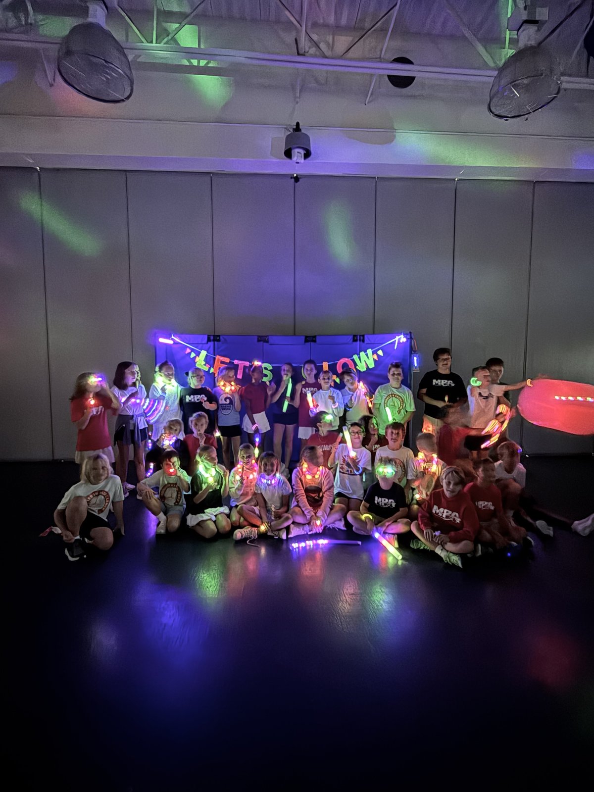 Glow sticks and bracelets lighting up the MPA Glow Party dance floor